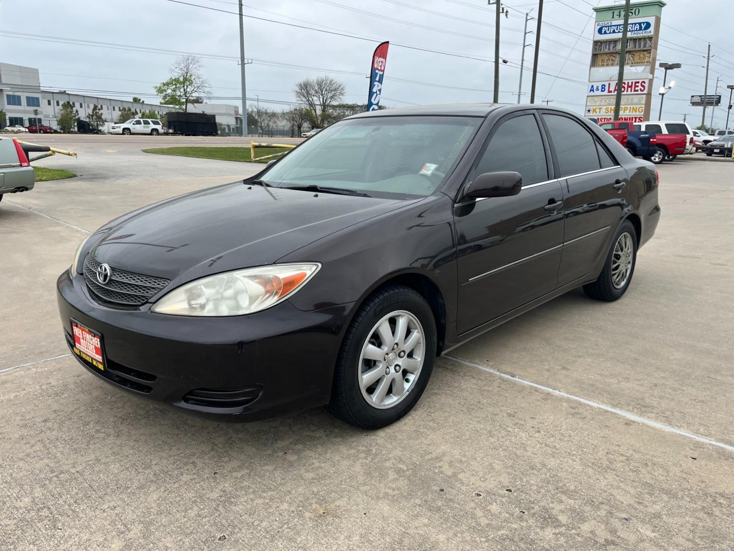 2002 BROWN /tan Toyota Camry LE V6 (JTDBF32K420) with an 3.0L V6 DOHC 24V engine, 4-Speed Automatic Overdrive transmission, located at 14700 Tomball Parkway 249, Houston, TX, 77086, (281) 444-2200, 29.928619, -95.504074 - Photo#2